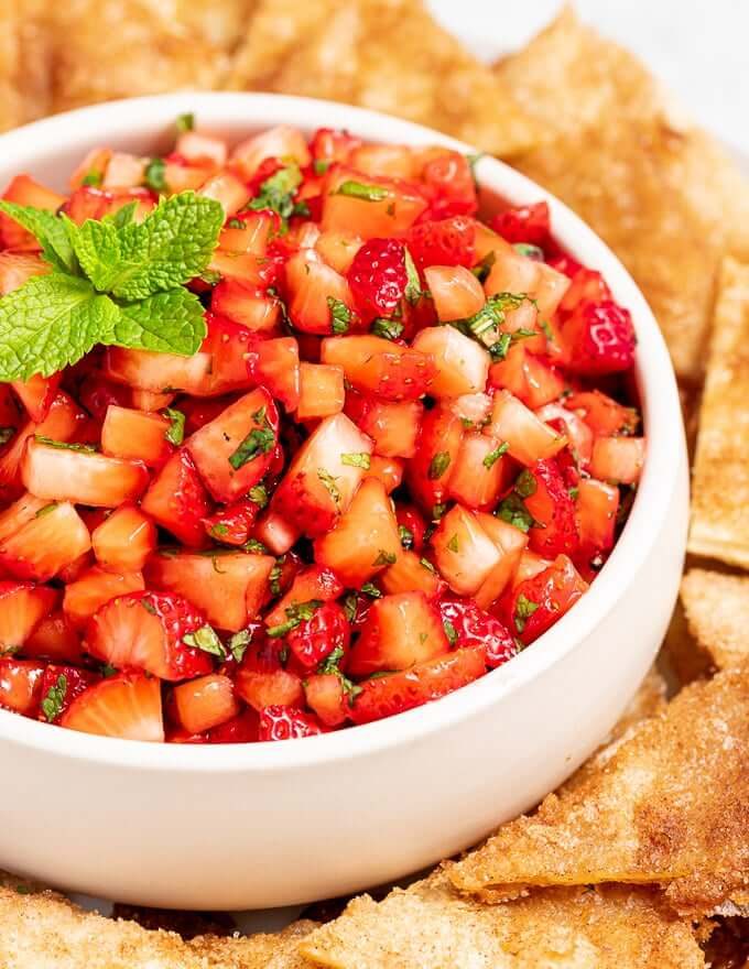 Fresh strawberry salsa featuring jalapeño heat, mint freshness, lime, and cilantro