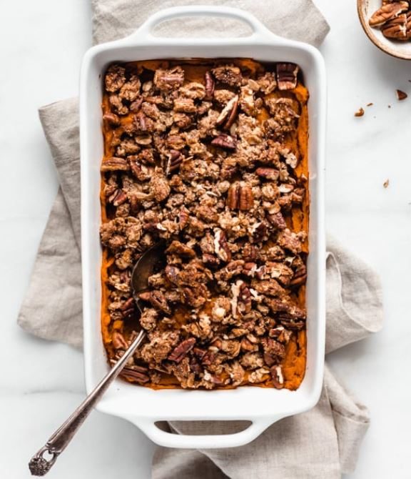 Silky classic sweet potato casserole infused with aromatic green cardamom and brown sugar glaze