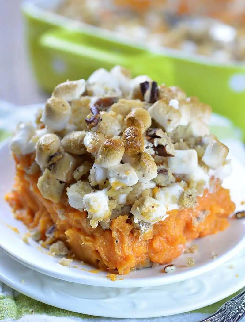Classic sweet potato casserole split with gooey toasted marshmallows and crunchy brown sugar pecan streusel.