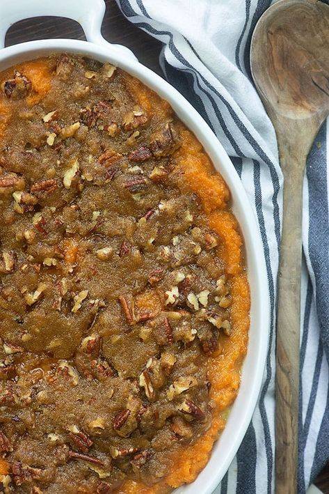 Bubbling classic sweet potato casserole drizzled with salted caramel, cinnamon, and crunchy pecan streusel.