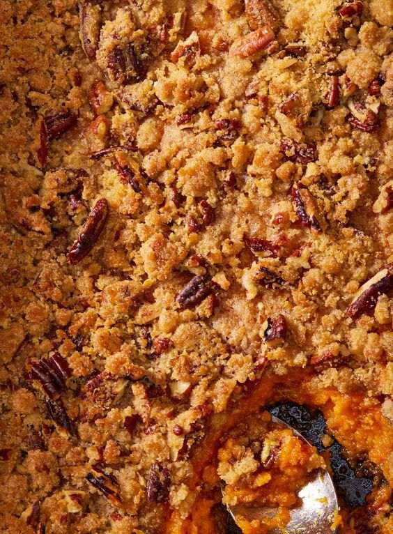 Golden classic sweet potato casserole topped with crisp toasted coconut, cinnamon, and brown sugar streusel.